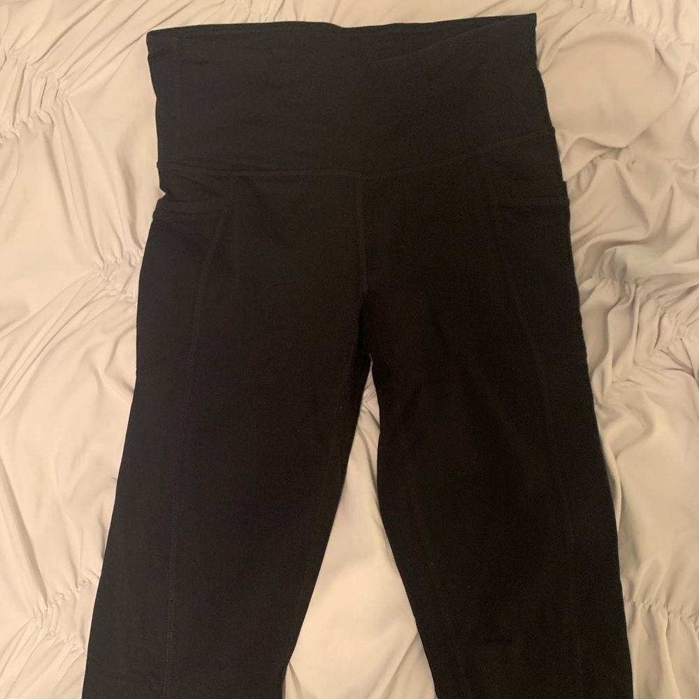 ATHLETA BLACK LEGGINGS W/ SIDE POCKET AND ZIP DEET